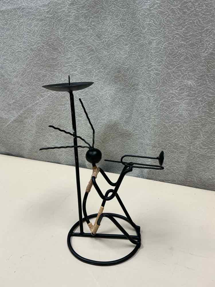 SETTING PERSON CANDLE HOLDER